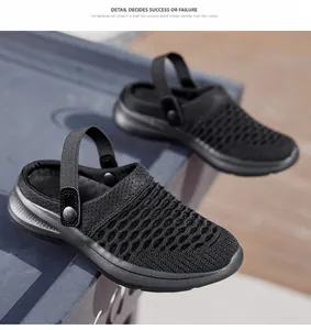 Detail showing breathable fly-weave texture of black women's summer slippers.
