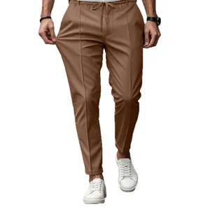 Men's slim-fit tapered casual pants in brown with drawstring waist for business.