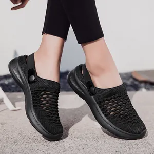 Breathable black fly-knit mesh sandals for women, stylish summer clogs for comfort