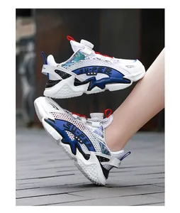Breathable white and blue kids running shoes with rotary dial closure system