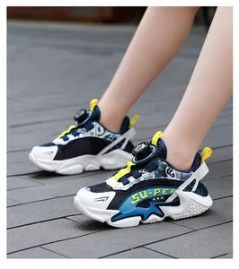 Detailed macro view of children's breathable mesh running shoes worn by a young model.