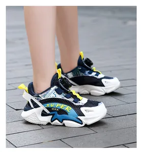 Detailed side view of breathable blue and white mesh children's sneakers with quick-lace dial