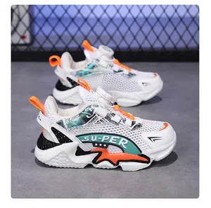 Detailed side view of kids' breathable mesh running shoes with orange accents and dial lacing