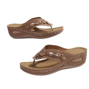 Brown wedge flip-flop sandals with metal chain and rhinestone decor for women