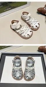 Detailed view of children's closed-toe summer sandals with cute bow and hollow star pattern