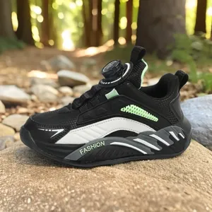 Zapatillas deportivas negras transpirables para niños con cierre de hebilla giratoria