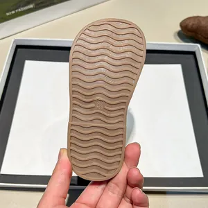 Anti-slip wavy sole of children's summer sandals showing size 23 measurement detail.