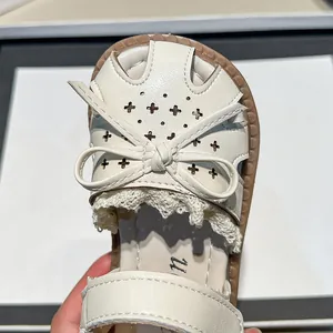 Girls closed-toe princess sandals with bow knot and hollow cross pattern