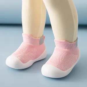 Pink breathable mesh baby walker shoes with soft white rubber anti-slip soles for toddlers