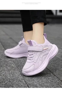 Breathable light purple children's running shoes featuring velcro straps and EVA foam sole