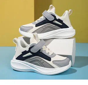 Breathable children's sports sneakers with velcro strap in navy and grey color
