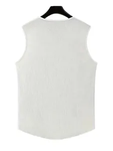 Detailed view of white textured fabric on a men's V-neck slim-fit sports tank top.