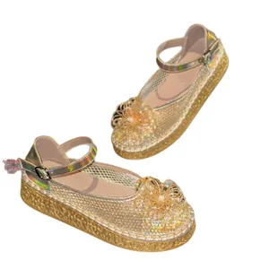 Ballerines Mary Jane dorées à plateforme en résille avec détails de fleurs