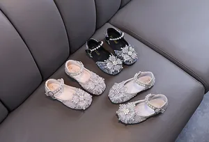 Sparkly girls' rhinestone princess Mary Janes in black, silver, and gold colors.