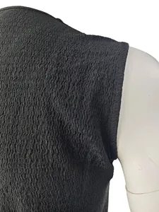 Close-up detail of breathable textured fabric on men's slim fitness vest sport top