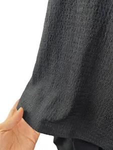 Detailed close-up showing the wavy breathable texture of a black men's sport tank top