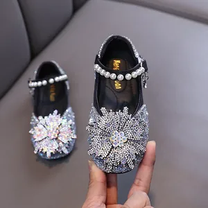 Elegant sparkly rhinestone princess shoes for girls with pearl strap and snowflake detail