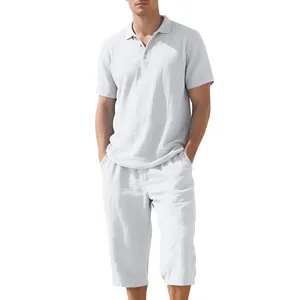 Detail view of men's white linen summer set with short sleeve polo and cropped pants