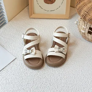 Stylish girls' white princess sandals with bow and rhinestone details for summer beach