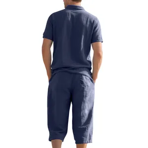 Back view of men's summer linen set featuring a navy blue polo shirt and cropped pants