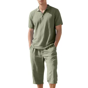 Close-up of olive green linen polo shirt and cropped pants set for men's summer wear