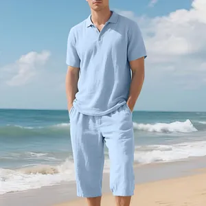 Detail of light blue men's linen beach set featuring a Polo shirt and capri pants