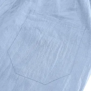 Macro view of the pocket and breathable linen fabric texture on men's summer set
