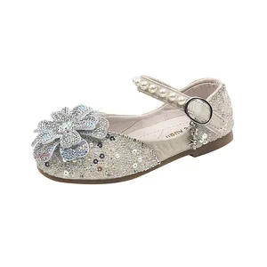 Elegant sparkling silver girl's princess Mary Jane shoes with rhinestone flower and pearl strap