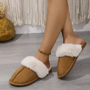 Comfortable brown suede house slippers with warm white faux fur trim for winter