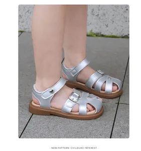 Silver closed-toe sandals for girls with comfortable soft soles and heart details.