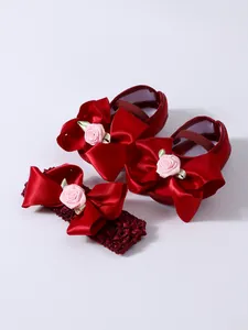 Zapatos de princesa para bebé en satén rojo con lazo de rosa para 0-1 año