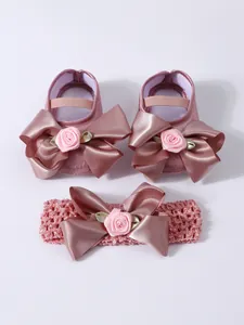 Elegantes zapatos de princesa rosa para bebé y conjunto de diadema con lazo rosa
