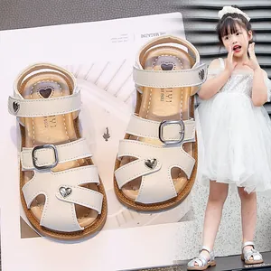 Elegant beige girls closed-toe sandals with silver heart buckles and soft anti-slip soles