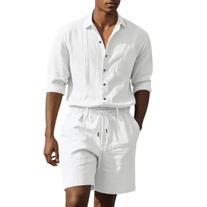 Detail shot of men's minimalist white linen long-sleeve shirt and drawstring shorts set