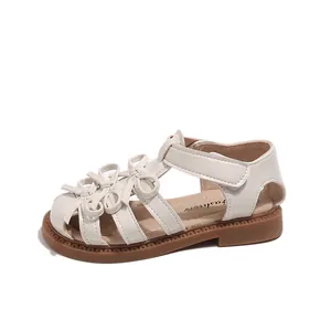 Elegant cream white girls' Lolita princess sandals with delicate bow detail and Velcro strap