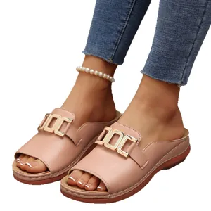 Comfortable pink platform sandals featuring a stylish metal buckle and open toe design