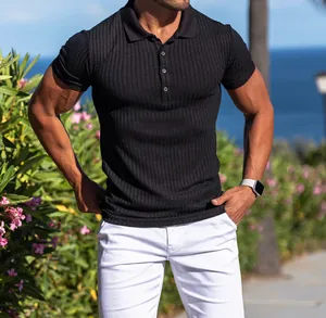 Detail shot of black ribbed slim fit athletic polo shirt for men in sunny outdoor setting