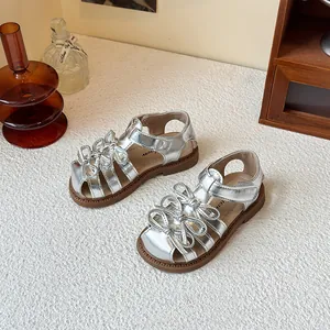 Stylish silver girls Lolita style sandals with cute bows and non-slip rubber soles