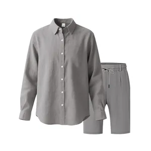 Detailed view of grey men's linen set featuring button-down shirt and drawstring shorts.