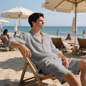 Men's comfortable grey loose linen shirt and shorts set on a sunny beach lounge chair