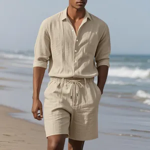 Full view of men's beige linen set on beach, showing texture and relaxed fit.