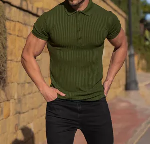 Close-up detail of men's olive green ribbed slim fit athletic polo shirt with buttons