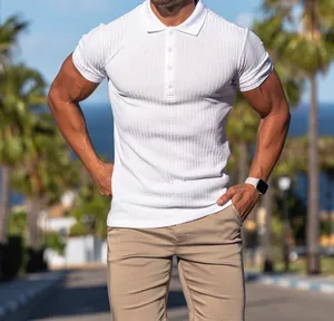 Slim fit white ribbed short sleeve Polo shirt for men in outdoor setting.