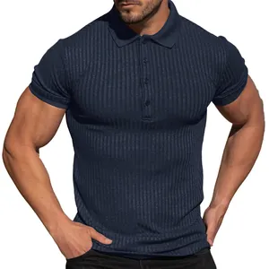 Macro view of navy blue ribbed polo shirt showing premium button detail and fine fabric texture