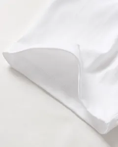 Close-up detail showing the seamless cuff and neat stitching of white cotton t-shirt