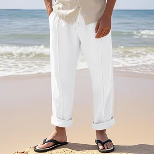 Relaxed fit men's white linen trousers for beach leisure wear with drawstring waist