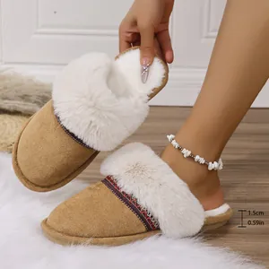 Detailed view of women's warm tan faux fur slippers featuring a 1.5cm thick platform sole