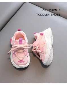 Top view of pink breathable mesh toddler sneakers with chunky white soles.