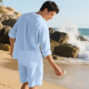 Men's light blue linen beach set featuring a textured long-sleeve shirt and matching shorts