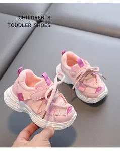 Close-up of pink breathable mesh toddler sneakers for girls and boys on a grey background